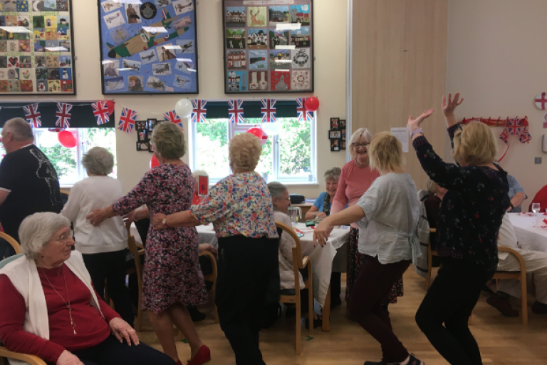 People dancing at the Centres for the Community