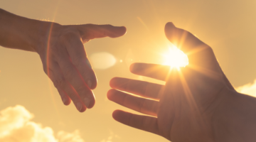 Hands in front of the sun