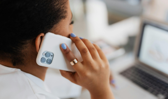 Woman holding mobile phone to ear