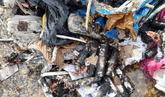 Burnt batteries in bin truck fire 