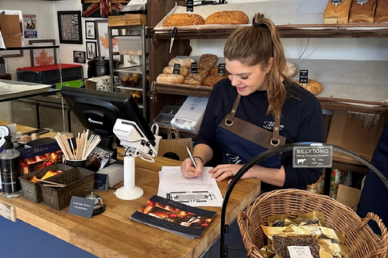 A person working at a farmers market