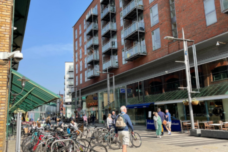 Outdoor shopping area with bicycle rack