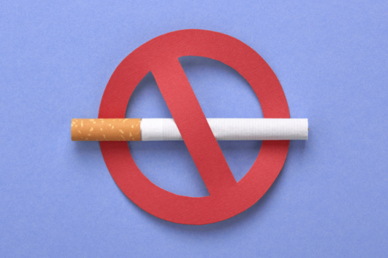 A cigarette in a red circle with a line through it