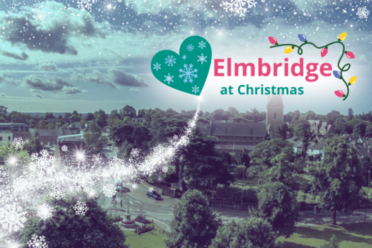 Birds eye view of Esher, tinted blue with snow and the Love Elmbridge at Christmas logo