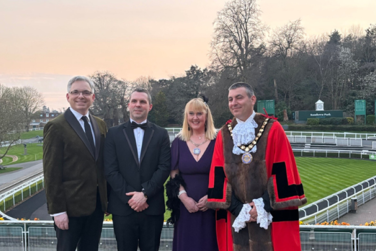 Mayor, mayoress and two men in suits