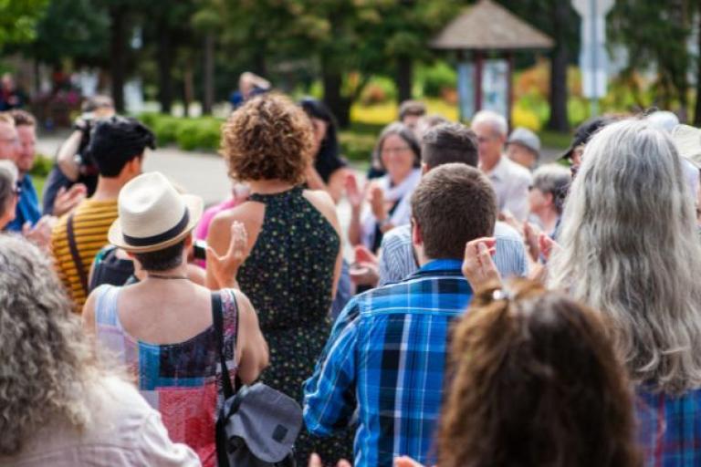 People gathered in a park setting
