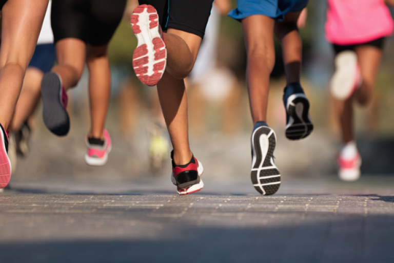 People running on tarmac