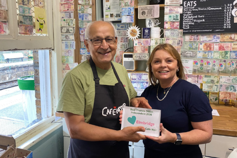 Al, owner of Cafe Noir, and Cllr Hewens presenting the Love Elmbridge Award.