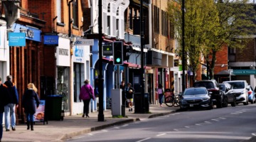 People walking along Cobham high street