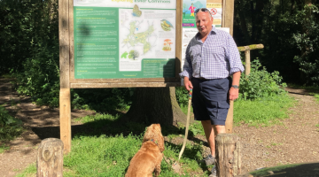 Cllr Waugh Portfolio Holder for Portfolio Holder for Leisure, Culture and Commercial Strategy with dog Chester.