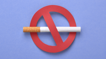 A cigarette in a red circle with a line through it