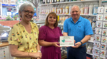Owners of The Card Collection with cllr Hewens and their 2024 Love Elmbridge award