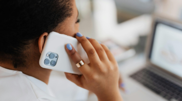 Woman holding mobile phone to ear
