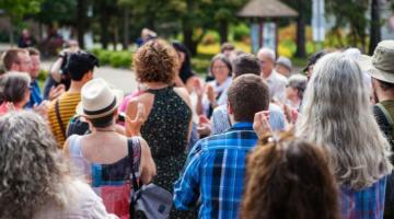 People gathered in a park setting